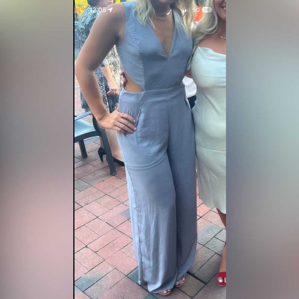 Gray backless, side cutout, wide leg jumpsuit.